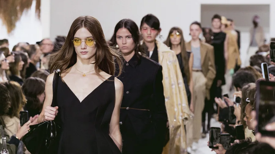 Celine Spring-Summer 2027 show: models walking the runway together, black looks at the front